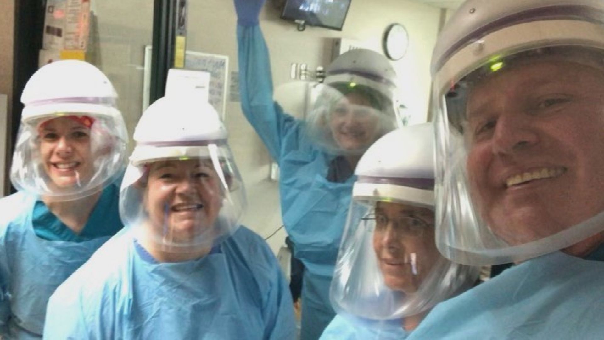 ICU NURSE SARAH MORROW WITH OTHER BAPTIST HEALT PADUCAH NURSES TAKING A QUICK MOMENT TO SMILE FOR A PICTURE WHILE WORKING BEHIND THE FRONTLINES OF THE PANDEMIC.jpg